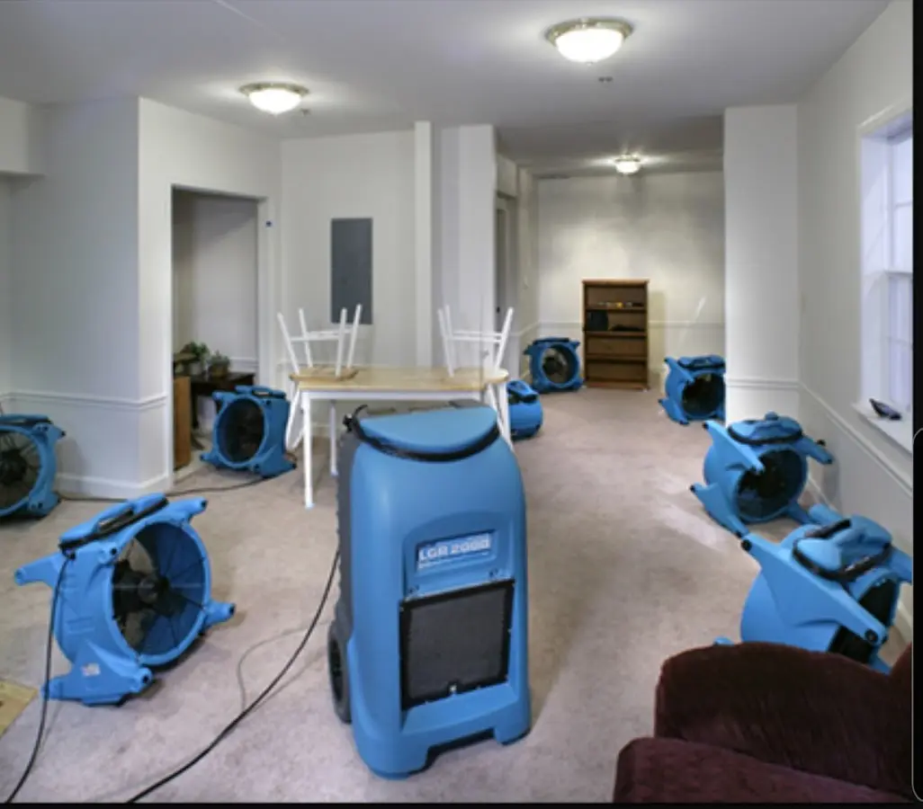 Air movers and dehumidifier setup for Water Damage Restoration in Manitowoc